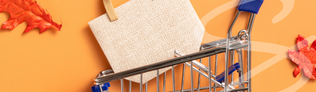 Shopping cart with leaves and gift bag