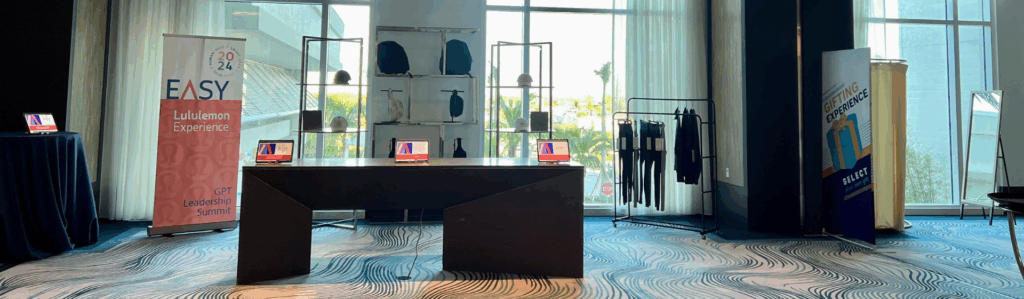 Onsite corporate gifting experience featuring boutique-style displays and curated gifts at a live corporate event.